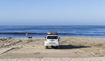 LAGUNA BEACH, CA - MAY 05: Lifeguards keep a lookout at Laguna Beach, CA after officials reopened access to the sand on Tuesday, May 5, 2020. The beach has been closed since March 23, 2020 due to the COVID-19 (coronavirus) outbreak. City parks along the beach are still closed and people cannot sit or linger on the sand. (Photo by Paul Bersebach/MediaNews Group/Orange County Register via Getty Images)