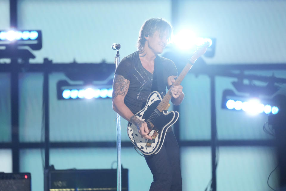 Keith Urban performs "Texas Time" at the 58th annual Academy of Country Music Awards on Thursday, May 11, 2023, at the Ford Center in Frisco, Texas. (AP Photo/Chris Pizzello)