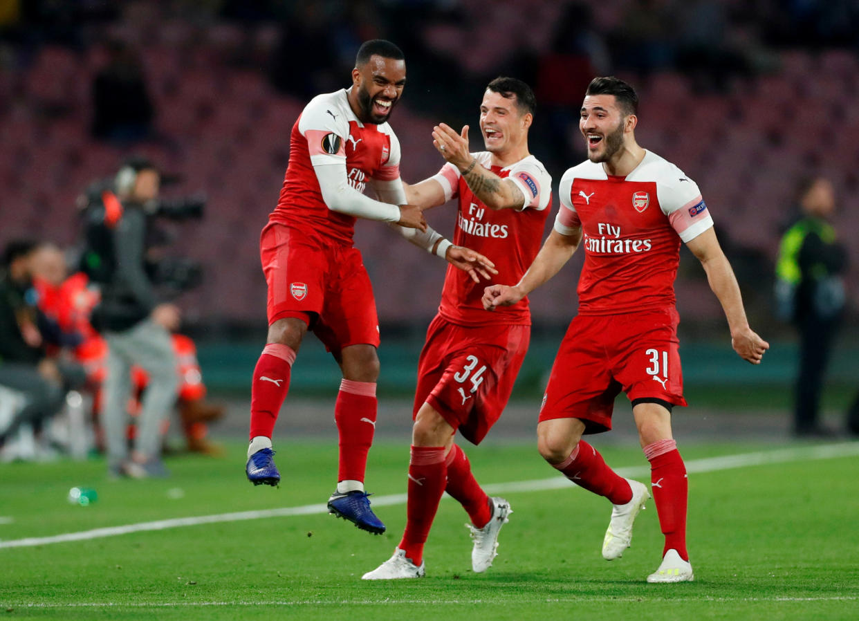 Alexandre Lacazette celebrates after his free-kick put Arsenal ahead and booked their spot in the semi-finals