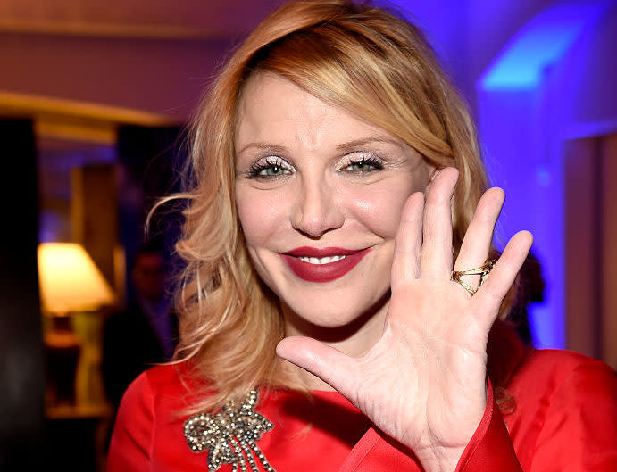 We are obsessed with Courtney Love’s red ruffled dress