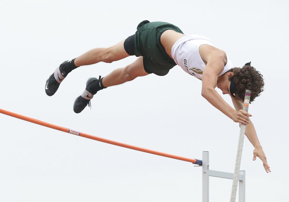 Layne Studer of GlenOak competes in the pole vault at the Division I District Track and Field Meet held at Hoover High School.