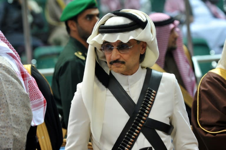 A file photo from February 18, 2014 of Prince Al-Waleed bin Talal attending a cultural festival in Riyadh
