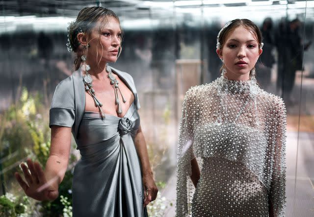 STEPHANE DE SAKUTIN/AFP Kate Moss and her daughter Lila model in Fendi's spring/summer 2021 Paris Fashion Week show on Jan. 27