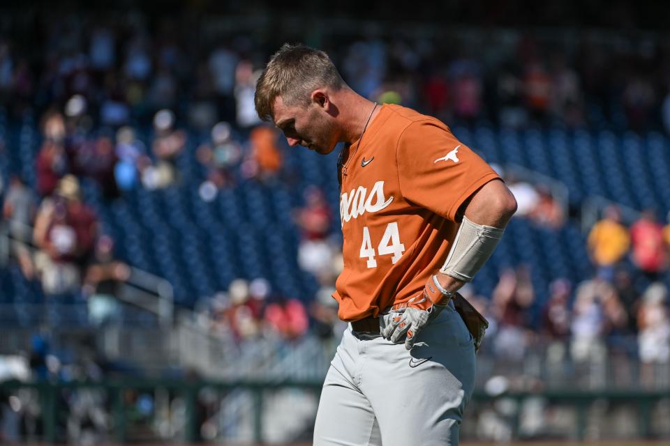 Texas' Austin Todd leaves the field after the Longhorns' season-ending 10-3 loss to Texas A&M. "We had an approach, and it's worked for us all year. We stuck with it," Todd said. "They made some pitches and we just didn't get the big hits at times."