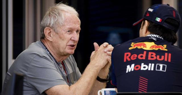 Helmut Marko talks to Sergio Perez. Bahrain February 2023. Credit: Alamy