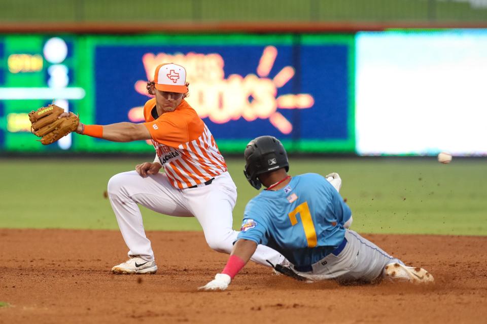Hooks second baseman Joey Loperfido attempts to force Amarillo Sod Poodles' Jonathan Guzman out at Whataburger Field on Wednesday, May 3, 2023, in Corpus Christi, Texas.