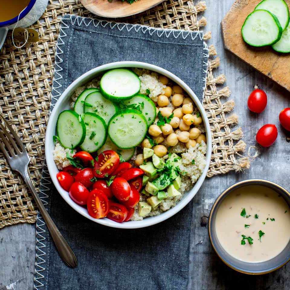 <p>It seems grain bowls have as many variations as there are stars in the sky, and there is no wrong way to build one! But we prefer to keep things classic and simple with hummus, quinoa, avocado and loads of veggies! <a href="https://www.eatingwell.com/recipe/259822/chickpea-quinoa-buddha-bowl/" rel="nofollow noopener" target="_blank" data-ylk="slk:View Recipe;elm:context_link;itc:0;sec:content-canvas" class="link ">View Recipe</a></p>