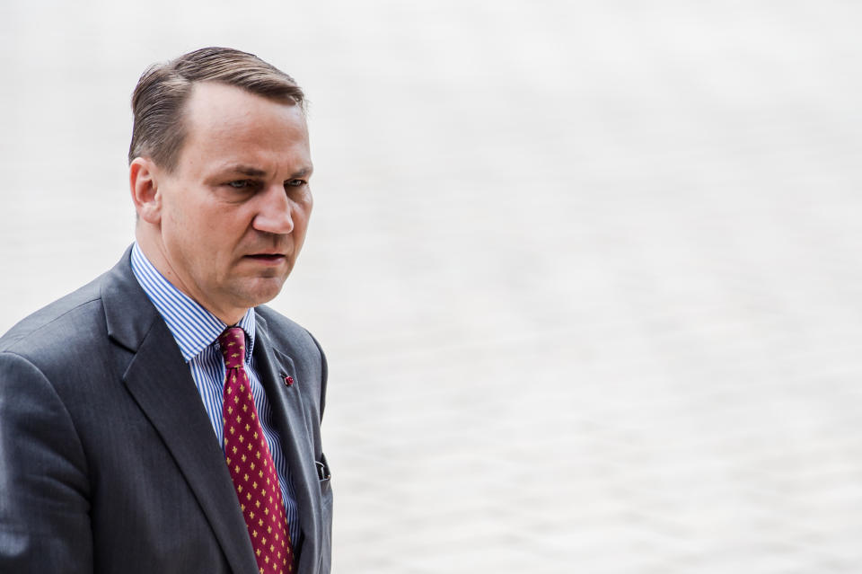 Poland's Foreign Minister Radoslaw Sikorski arrives for an EU foreign ministers meeting at the EU Council building in Luxembourg, Monday, April 14, 2014. EU foreign ministers meet Monday to discuss the crisis in Syria and Ukraine and hold an in-depth exchange on Bosnia and Herzegovina. (AP Photo/Geert Vanden Wijngaert)