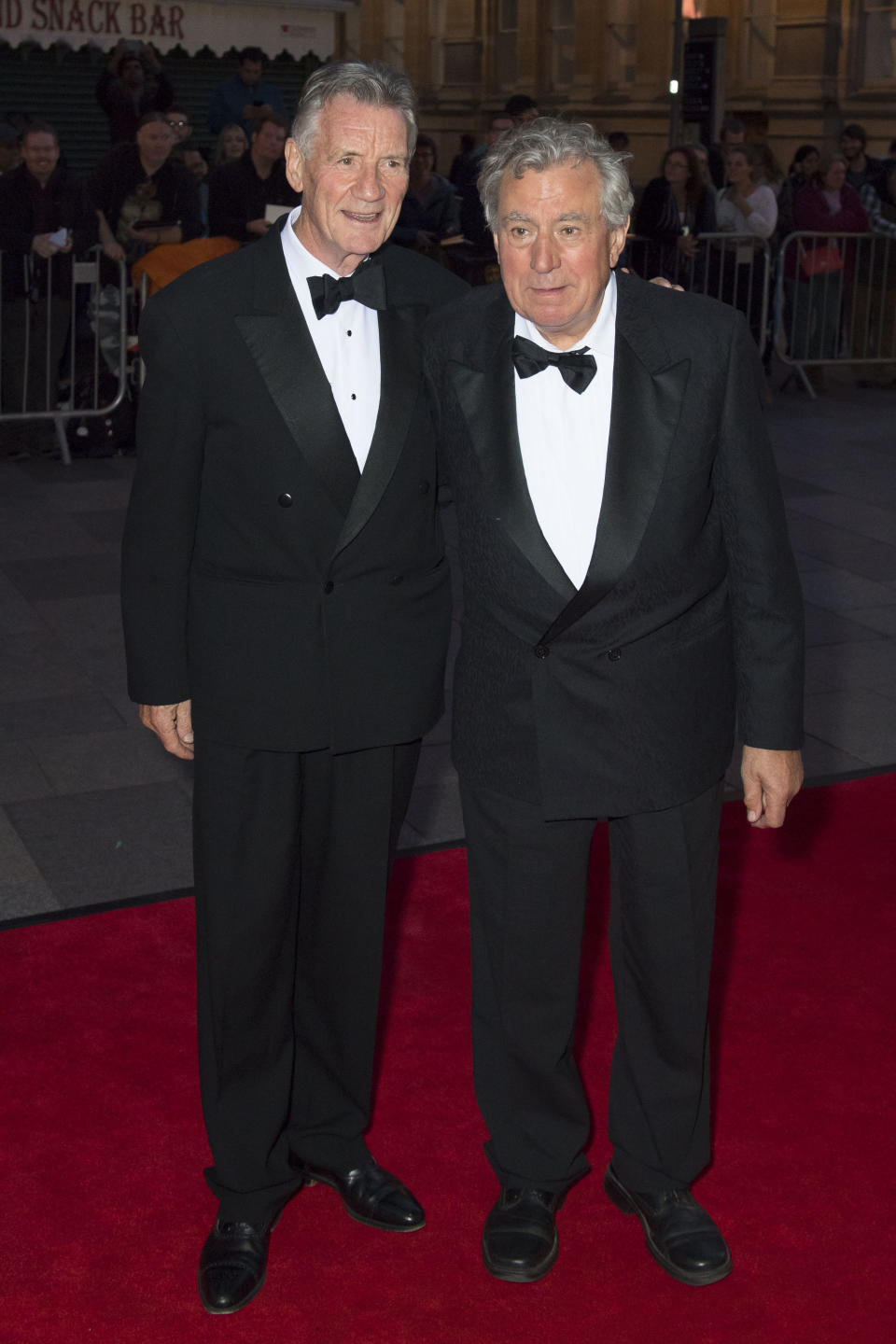 Michael Palin (L) and Terry Jones arrive for the 25th British Academy Cymru Awards at St David's Hall on October 2, 2016 in Cardiff, Wales.  (Photo by Matthew Horwood/Getty Images)