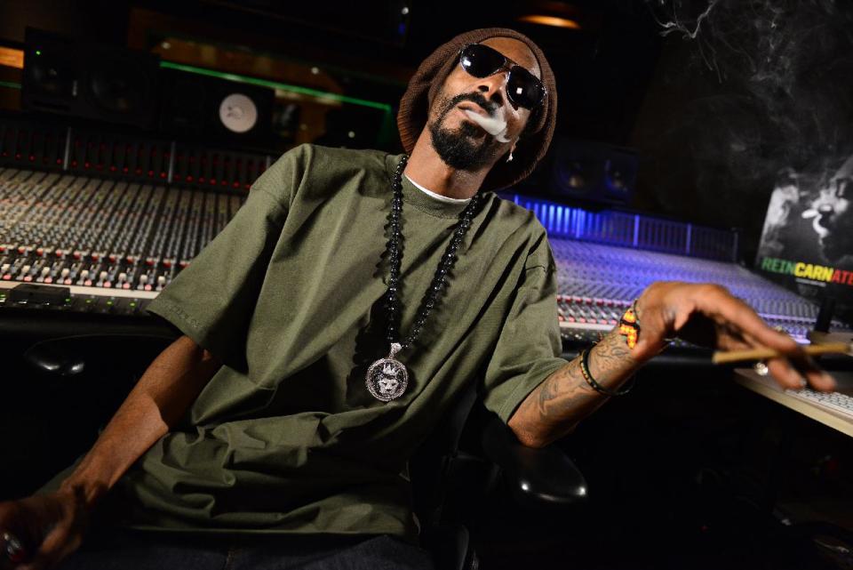 In this Tuesday, March 5, 2013 photo, Snoop Lion poses for a portrait at the Westlake Recording Studios in Los Angeles. How committed is Snoop Dogg to his new moniker Snoop Lion? He is using the name to release a reggae- and dancehall-focused album releasing on April 23, 2013. (Photo by Jordan Strauss/Invision/AP)