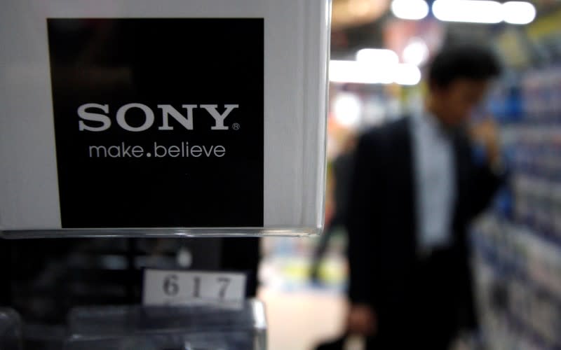 A man looks at Sony Corp's products at an electronics store in Tokyo May 26, 2011. REUTERS/Toru Hanai/Files