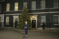 British Prime Minister Theresa May makes a statement outside 10 Downing Street, in London, Wednesday December 12, 2018. British Prime Minister Theresa May survived a brush with political mortality Wednesday, winning a no-confidence vote of her Conservative lawmakers that would have ended her leadership of party and country (AP Photo/Tim Ireland)