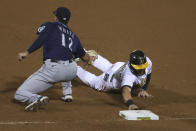 Oakland Athletics' Robbie Grossman, right, is tagged out at first base by Seattle Mariners' Evan White during the seventh inning of a baseball game in Oakland, Calif., Friday, Sept. 25, 2020. (AP Photo/Jed Jacobsohn)