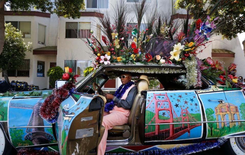 Wardell Walters drives his vehicle "Star 1", a tribute to the city during the annual Juneteenth Parade as it rolls through the Fillmore District neighborhood on Saturday 14, 2014, in San Francisco , Calif.