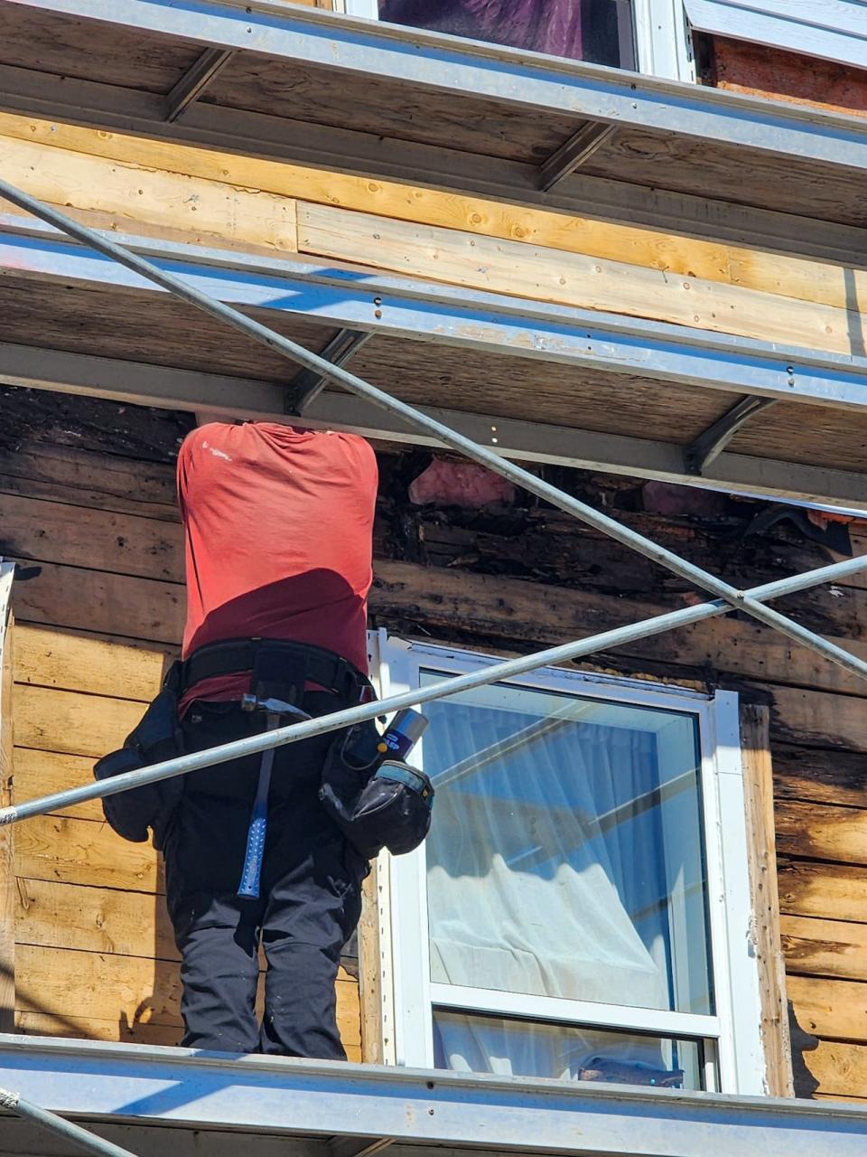 Workers removed the vinyl siding at 119 Guilford St. to expose a lot of rotten wood underneath, particularly around this second-floor window. 