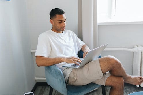 <span class="caption">Sitting with legs crossed for prolonged periods may have negative health effects, expert warns.</span> <span class="attribution"><a class="link " href="https://www.pexels.com/photo/a-man-using-a-laptop-8553844/" rel="nofollow noopener" target="_blank" data-ylk="slk:Polina Tankilevitch/Shutterstock;elm:context_link;itc:0;sec:content-canvas">Polina Tankilevitch/Shutterstock</a></span>