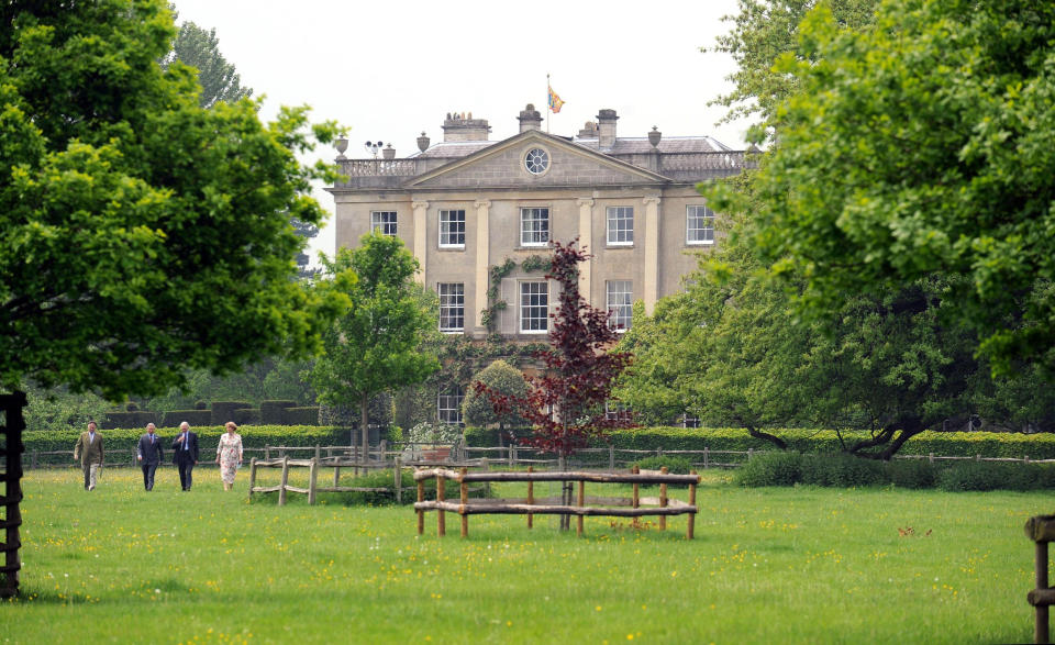 TETBURY- MAY 23 : (NO PUBLICATION IN UK MEDIA FOR 28 DAYS)  Prince Charles, Prince of Wales (2nd left) walks to plant a tree at his Highgrove home on May 23, 2008 in Tetbury, England.    (Photo by Pool/Anwar Hussein Collection/WireImage)