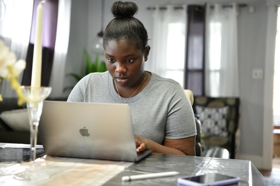 Queenie-Michelle Asare-Gyan does her schooling remotely from her home in Fair Lawn, N.J. on Friday April 30, 2021. 