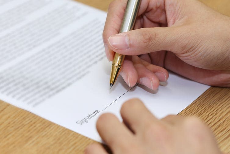 <span class="caption">Consent needs to be as informed as it can.</span> <span class="attribution"><a class="link " href="https://www.shutterstock.com/image-photo/close-on-businessman-hand-signing-contract-394377388" rel="nofollow noopener" target="_blank" data-ylk="slk:charnsitr/Shutterstock;elm:context_link;itc:0;sec:content-canvas">charnsitr/Shutterstock</a></span>