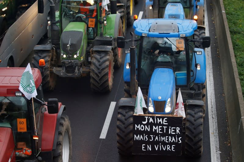 French farmers drive on the A1 Lille-Paris motorway during a protest towards Paris