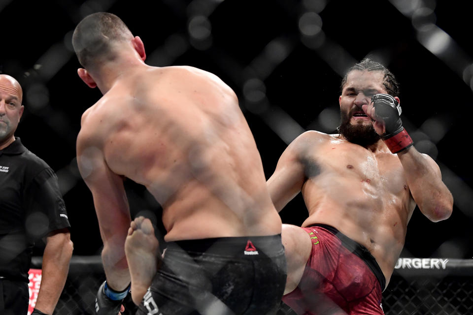 Jorge Masvidal (right) throws a kick at Nate Diaz during the "BMF" championship bout at UFC 244 on Saturday at Madison Square Garden. (Photo by Steven Ryan/Getty Images)