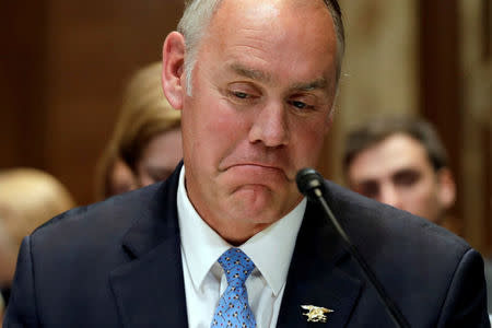FILE PHOTO: U.S. Interior Secretary Ryan Zinke testifies before a Senate Appropriations Interior, Environment, and Related Agencies Subcommittee hearing on the FY2019 funding request and budget justification for the Interior Department, on Capitol Hill in Washington, U.S., May 10, 2018. REUTERS/Yuri Gripas/File Photo