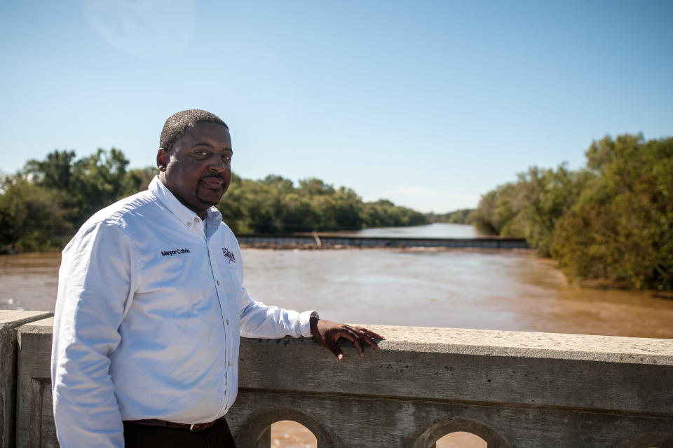 In Fayetteville, Mayor Mitch Colvin stands atop the Person Street bridge on Tuesday, which spans the Cape Fear River.<i></i><i></i> (Photo: Joseph Rushmore for HuffPost)