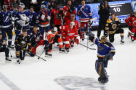 St. Louis Blues goalie Jordan Binnington (50) celebrates after winning the Skills Competition save streak competition, part of the NHL hockey All-Star weekend, Friday, Jan. 24, 2020, in St. Louis. (AP Photo/Jeff Roberson)