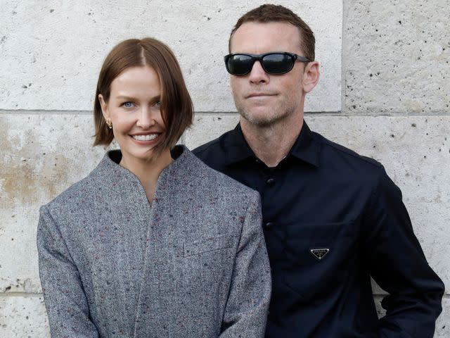 <p>Antoine Flament/Getty</p> Lara Worthington and Sam Worthington attend the OTW By Vans Party during Paris Fashion Week in 2023