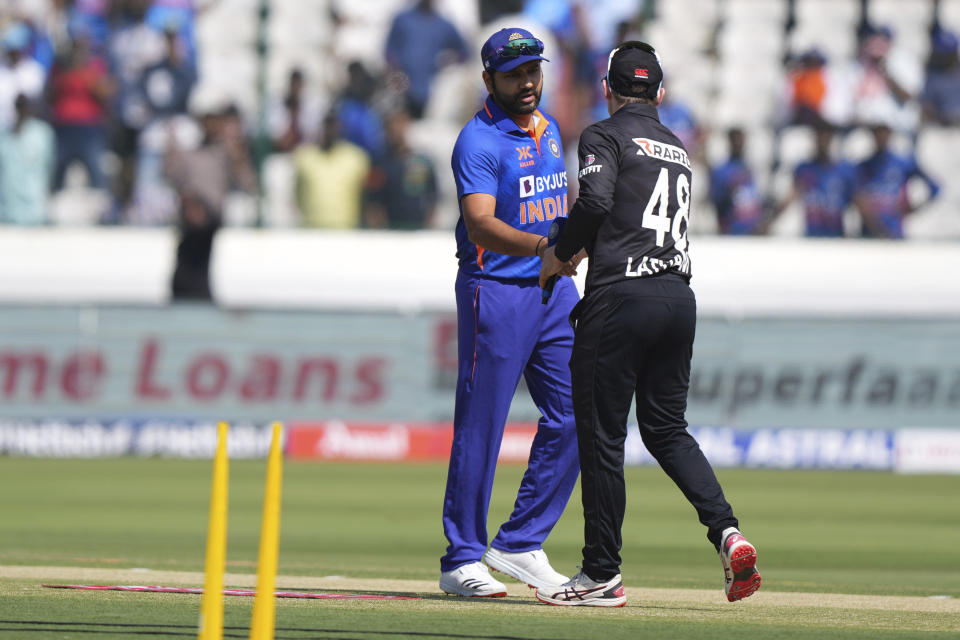 India's captain Rohit Sharma, left, shakes hands with New Zealand's captain Tom Latham after winning the toss ahead of the first one-day international cricket match between India and New Zealand in Hyderabad, India, Wednesday, Jan. 18, 2023. (AP Photo/Mahesh Kumar A.)