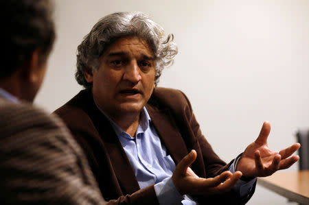 Matiullah Jan, a journalist and columnist, gestures during an interview with Reuters at his office in Islamabad, Pakistan March 13, 2019. Picture taken March 13, 2019. REUTERS/Akhtar Soomro