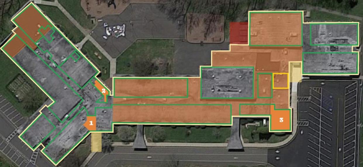 An overhead view of Rockaway Valley School highlighting areas in need of renovation or improvement funded by a proposed $11 million bond referendum.