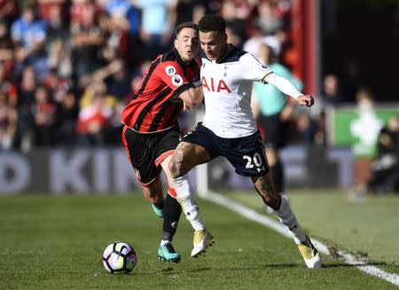 Football Soccer Britain - AFC Bournemouth v Tottenham Hotspur - Premier League - Vitality Stadium - 22/10/16 Bournemouth's Dan Gosling in action with Tottenham's Dele Alli Reuters / Dylan Martinez Livepic EDITORIAL USE ONLY.