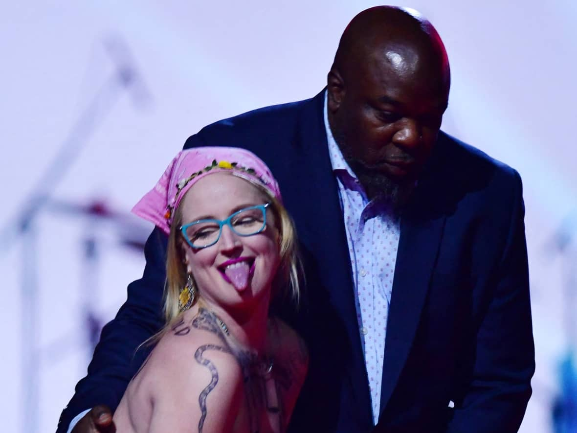 Casey Hatherly, centre, was unapologetic about her public protest at the Juno Awards in Edmonton on Monday night. (Ed Kaiser/Reuters - image credit)