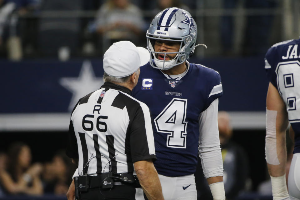 Officials corrected a mistake after confusion over Dak Prescott's coin toss verbiage. (AP Photo/Michael Ainsworth)