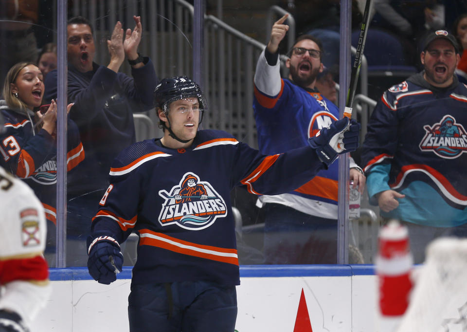 New York Islanders defenseman Ryan Pulock celebrates his goal during the second period of an NHL hockey game against the Florida Panthers Friday, Dec. 23, 2022, in Elmont, N.Y. (AP Photo/John Munson)