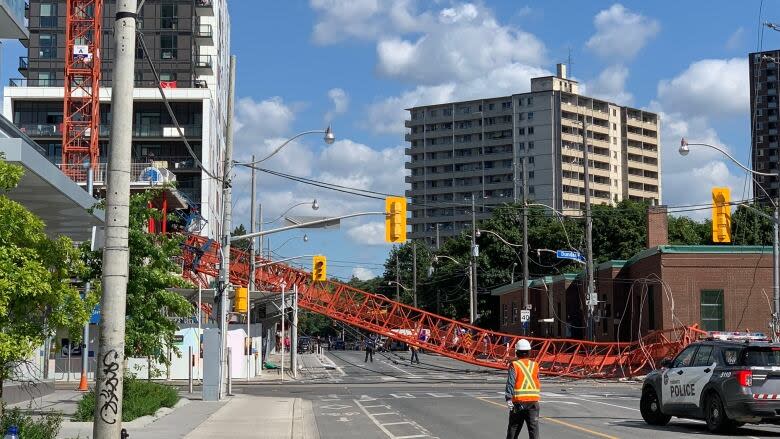 The crane collapsed on the intersection of River and Dundas Street in Toronto just after 10:30 a.m. (Philip C/Twitter)