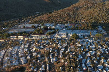 A view of the Moria camp for refugees and migrants and part of a makeshift camp set next to Moria, on the island of Lesbos, Greece, September 19, 2018. REUTERS/Giorgos Moutafis