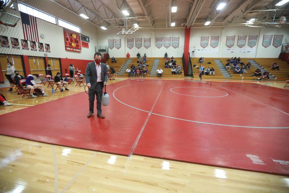 Canandaigua wrestling coach Eric Mullen says it doesn't matter who is wrestling as long as kids are wrestling.