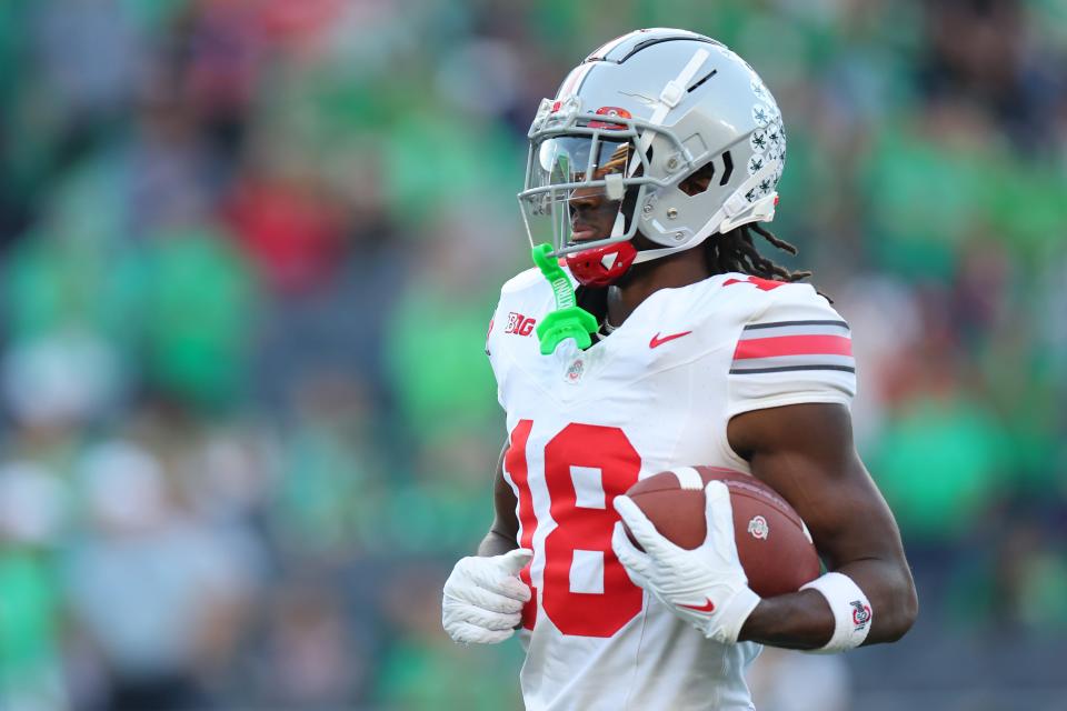 Marvin Harrison Jr. #18 of the Ohio State Buckeyes looks on prior to the game against the Notre Dame Fighting Irish at Notre Dame Stadium on Sept. 23, 2023, in South Bend, Indiana.