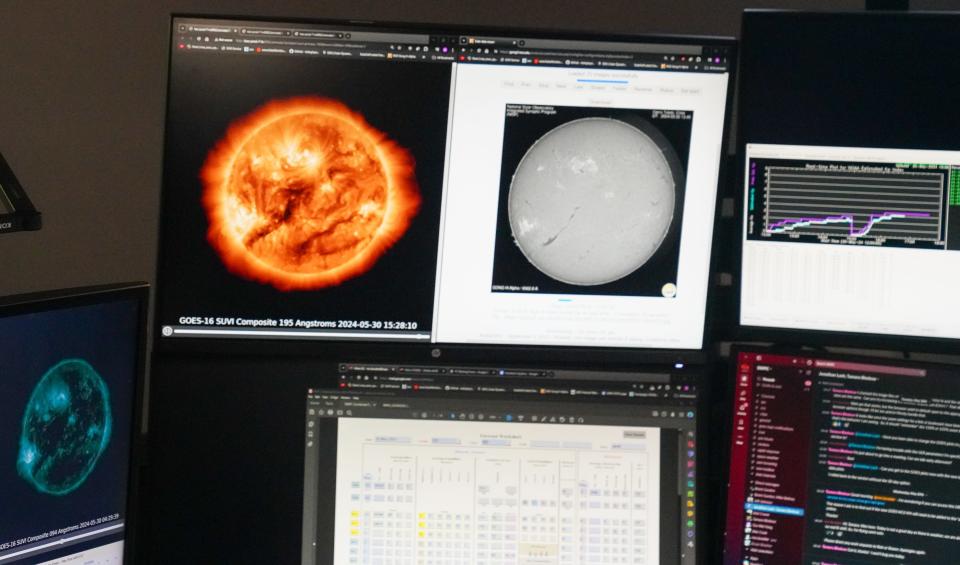 Satellite feeds and other data displayed at the federal Space Weather Prediction Center in Boulder.