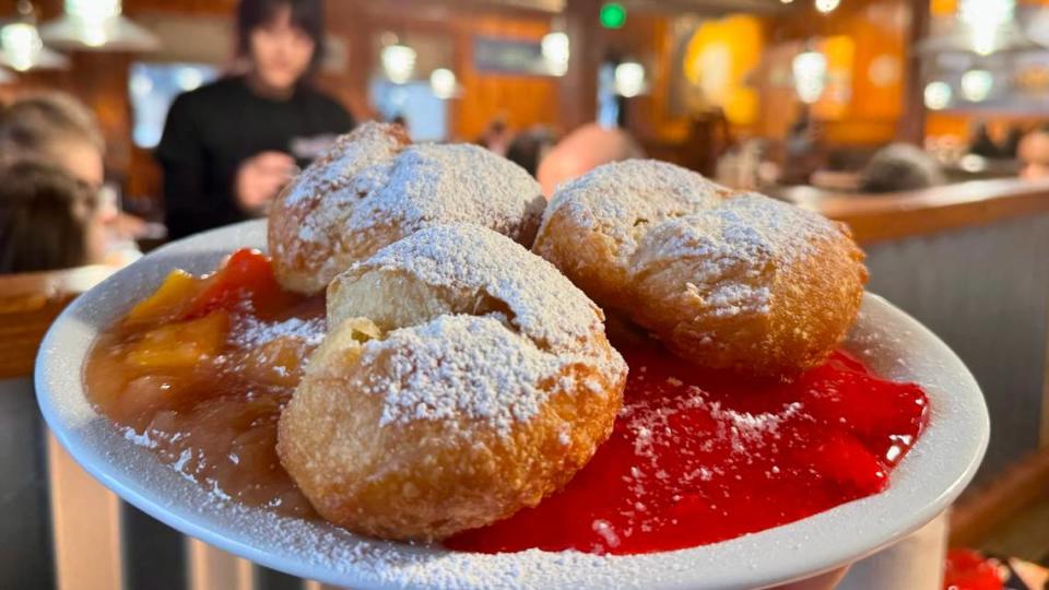 “Mardi Gras” beignets at Huckleberry’s come with strawberries, peaches and huckleberries.