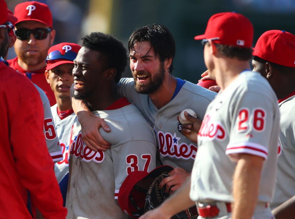Phillies starting pitcher Cole Hamels and center fielder Odubel Herrera celebrate after Hamels' no-hitter at Wrigley Field in 2015.