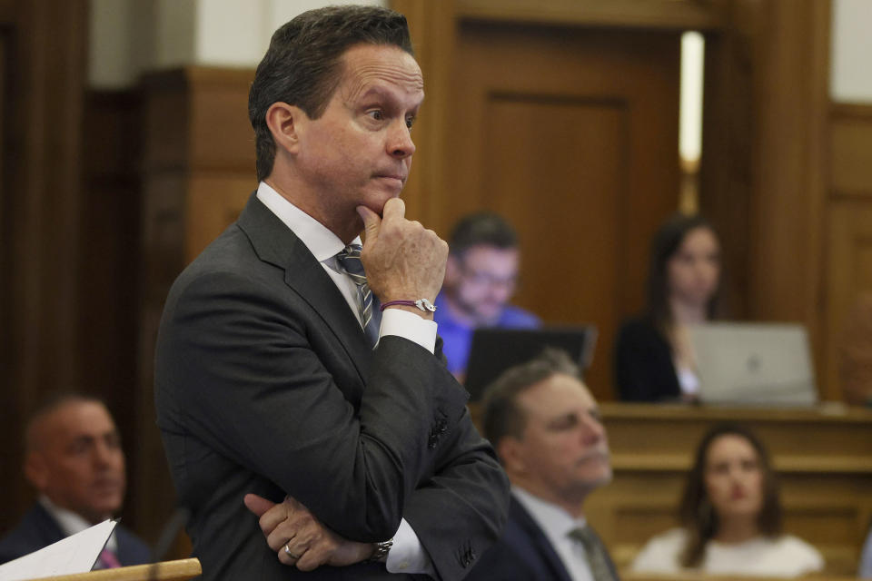 Karen Read's defense attorney Alan Jackson questions a witness during Read's murder trial, Tuesday, April 30, 2024, in Dedham, Mass. Read, 44, of Mansfield, faces several charges including second degree murder in the death of her Boston Police officer boyfriend John O’Keefe, 46, in 2022. (Nancy Lane/The Boston Herald via AP, Pool)