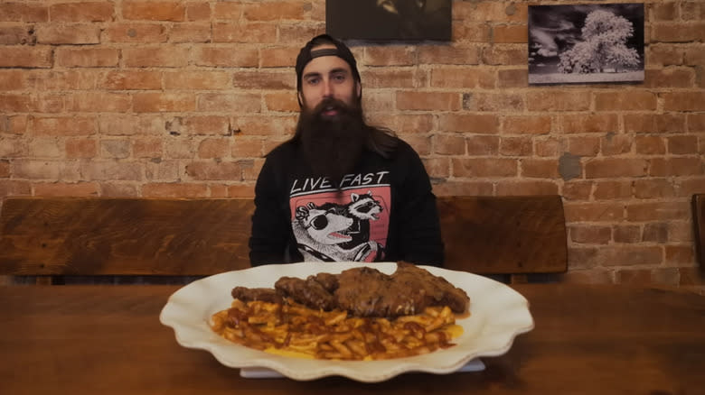 Adam Moran with huge schnitzel