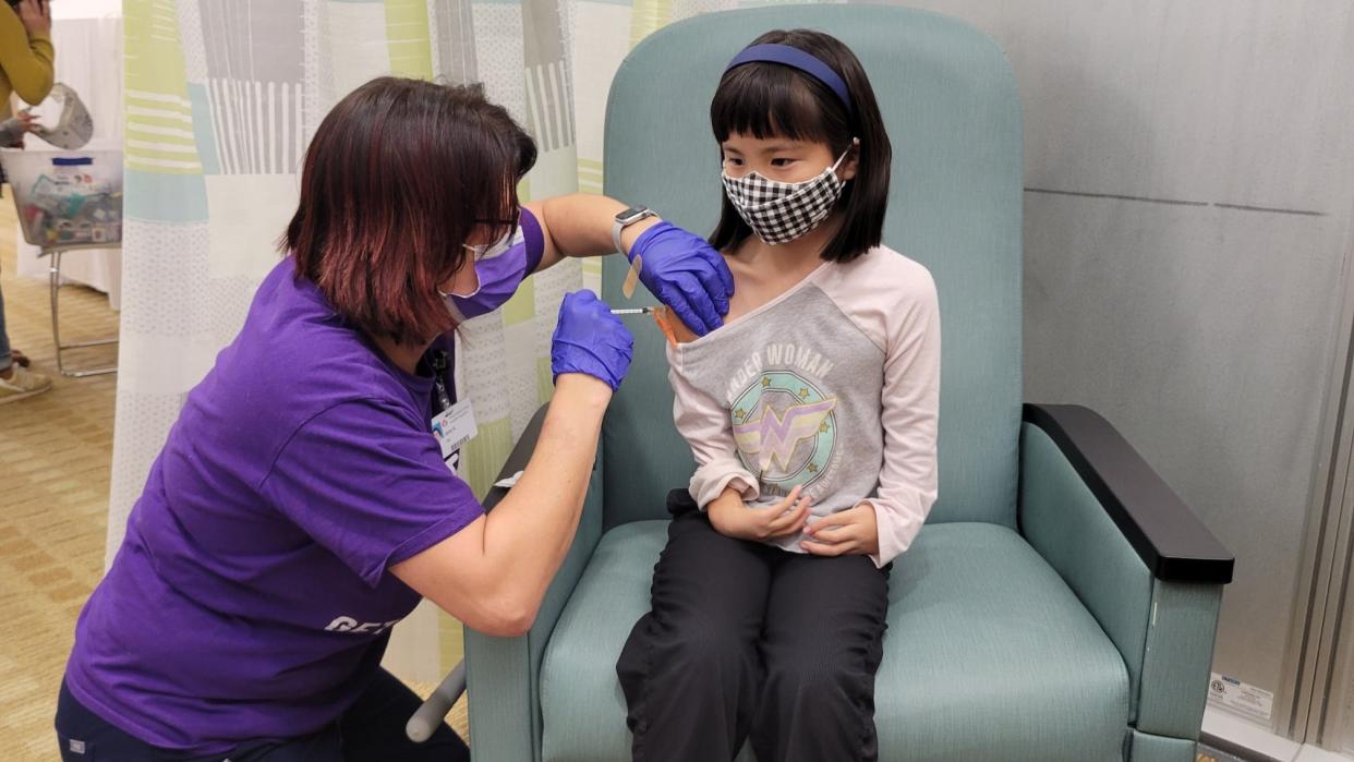 Sarah Baker, 9, of Wausau, receives the pediatric Pfizer-BioNTech COVID-19 vaccine at Marshfield Medical Center-Weston. The pediatric vaccine is given in two doses, 21 days apart and is one-third of the adult dose.