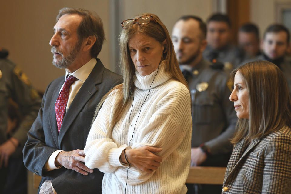 Michelle Troconis listens as a verdict of guilty on all counts is read on the final day jury deliberation for her criminal trial at Connecticut Superior Court in Stamford, Conn. Friday, March 1, 2024. Troconis was found guilty by the jury following a lengthy trial in which prosecutors laid out a case that she helped her then-boyfriend, Fotis Dolus, plot and cover up the killing of his estranged wife, Jennifer Dulos, as they battled each other in divorce and child custody proceedings. (Ned Gerard/Hearst Connecticut Media via AP, Pool)