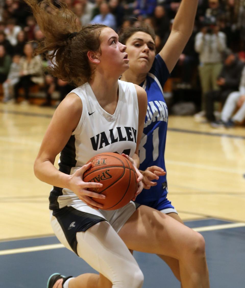 Putnam Valley's Eva DeChent (21) goes up for a shot against Haldane on her way to scoring her 2,000th point in game at Putnam Valley High School Feb. 7, 2023. 