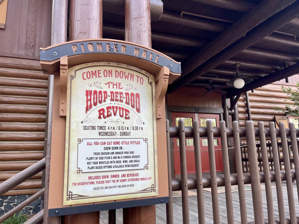 Hoop-De-Doo Revue at Disney World wooden sign in front of steps