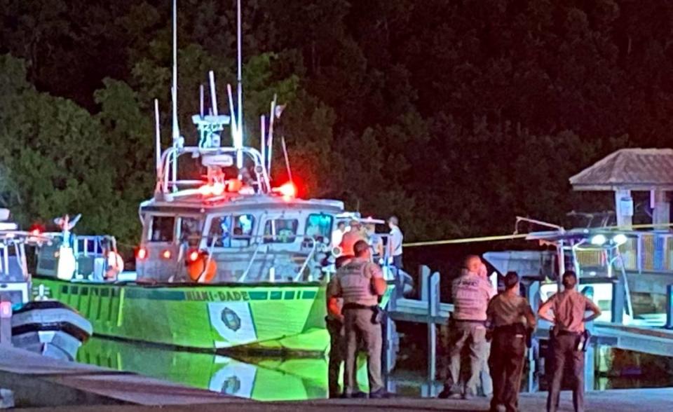 A Miami-Dade County Fire Rescue boat pulls into a slip at Black Point Marina Sunday night, Sept. 4, 2022. The boat brought to shore several people injured in a boating crash earlier that night.